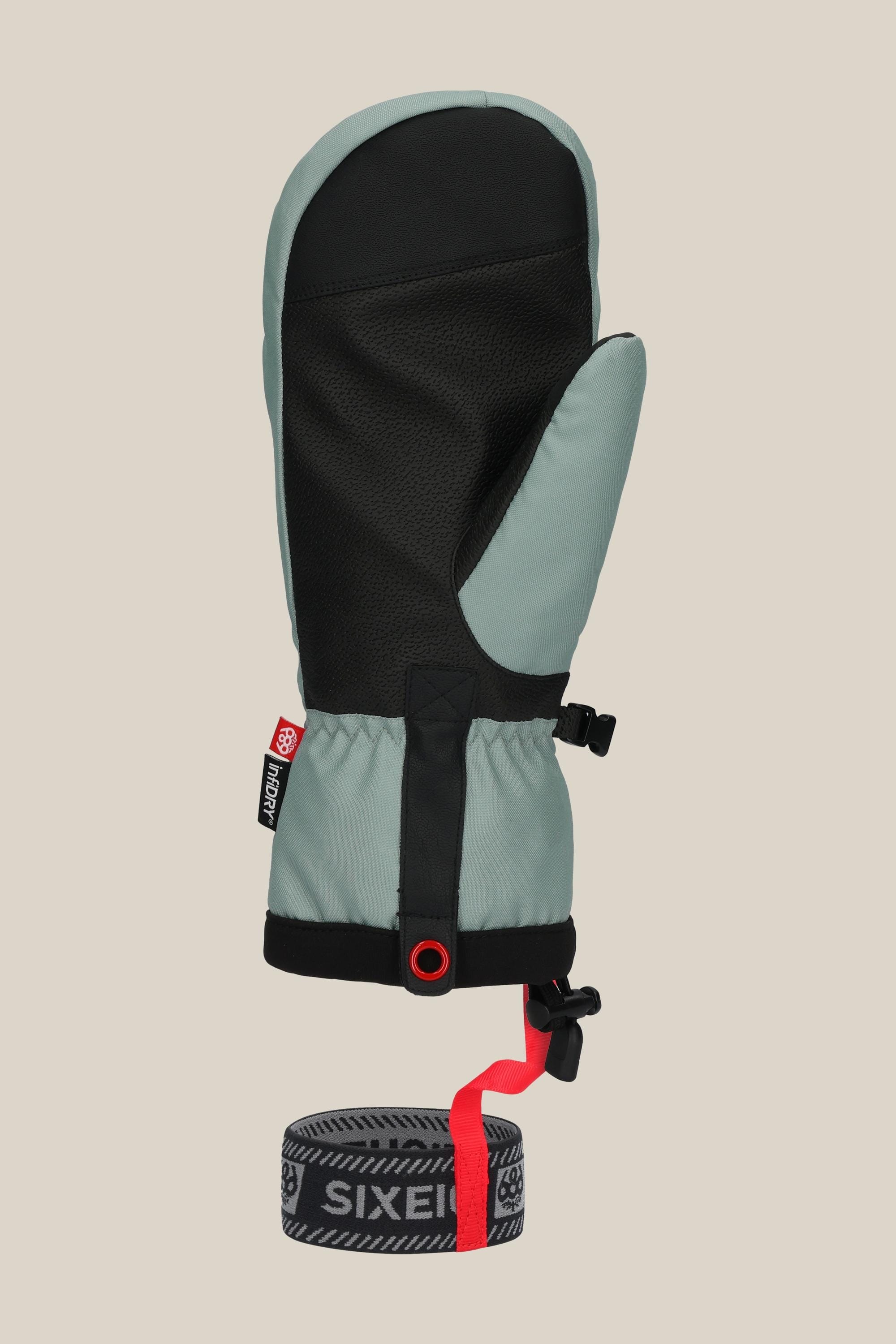 The 686 Mens Team Merino Mitt in gray and black offers internal finger separation for warmth, a wrist strap, detachable SIXEIGHT elastic band, red tab, and adjustable closure—shown on a plain beige background.