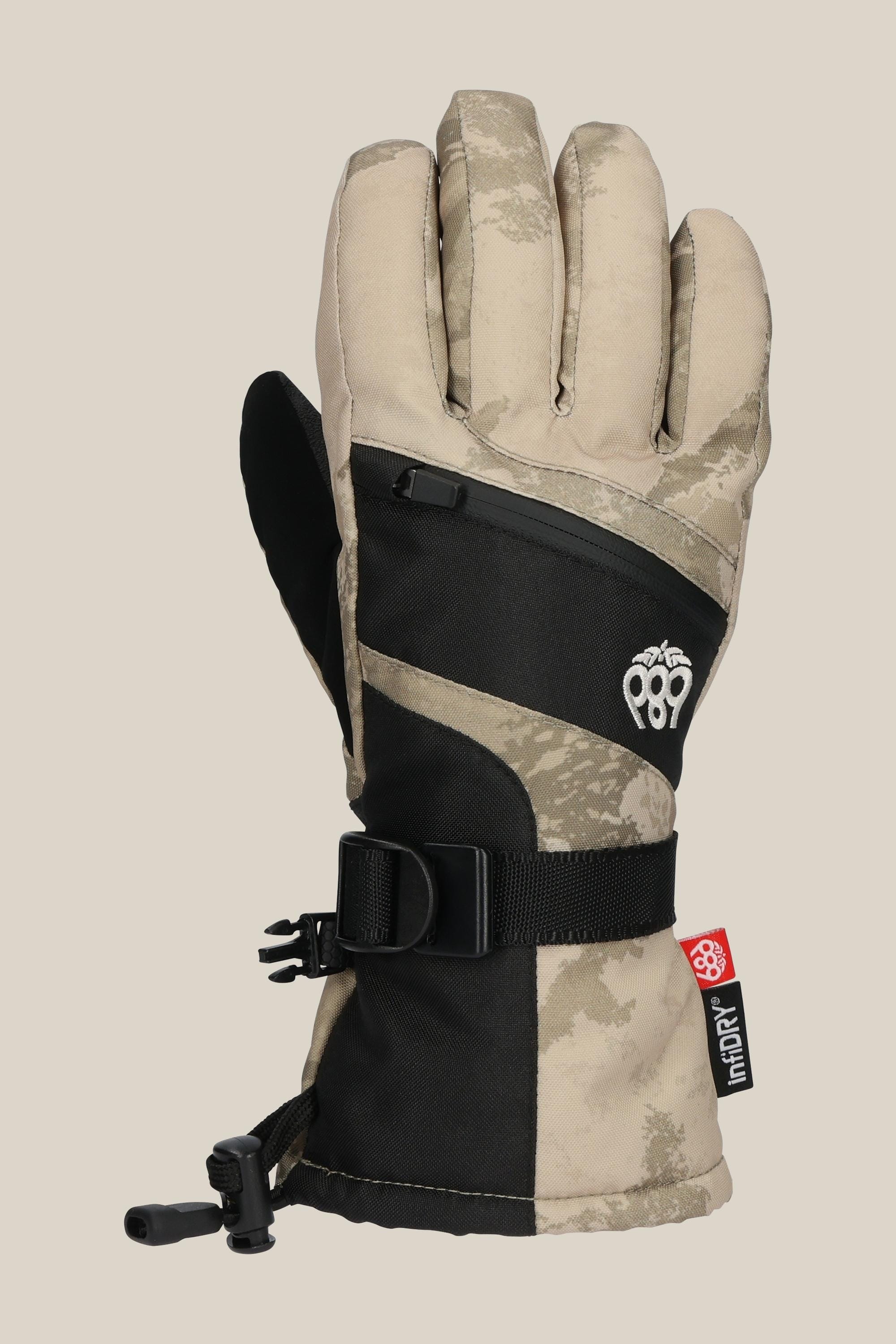 The 686 Youth Heat Glove by 686 features a tan and black geometric design, adjustable strap, wrist drawstring, and a small white paw logo. Its insulated build keeps fingers warm during cold weather activities.