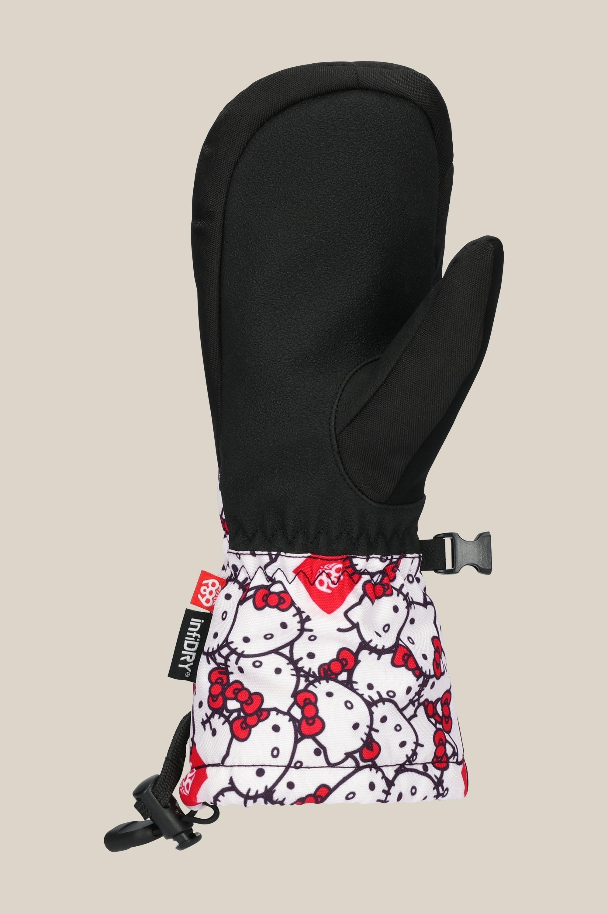 The 686 Youth Heat Mitt by 686 is a black and white mitten with a black thumb and top, featuring Hello Kitty face patterns with red bows on the cuff. It includes a black clip and tag—perfect for winter accessories.