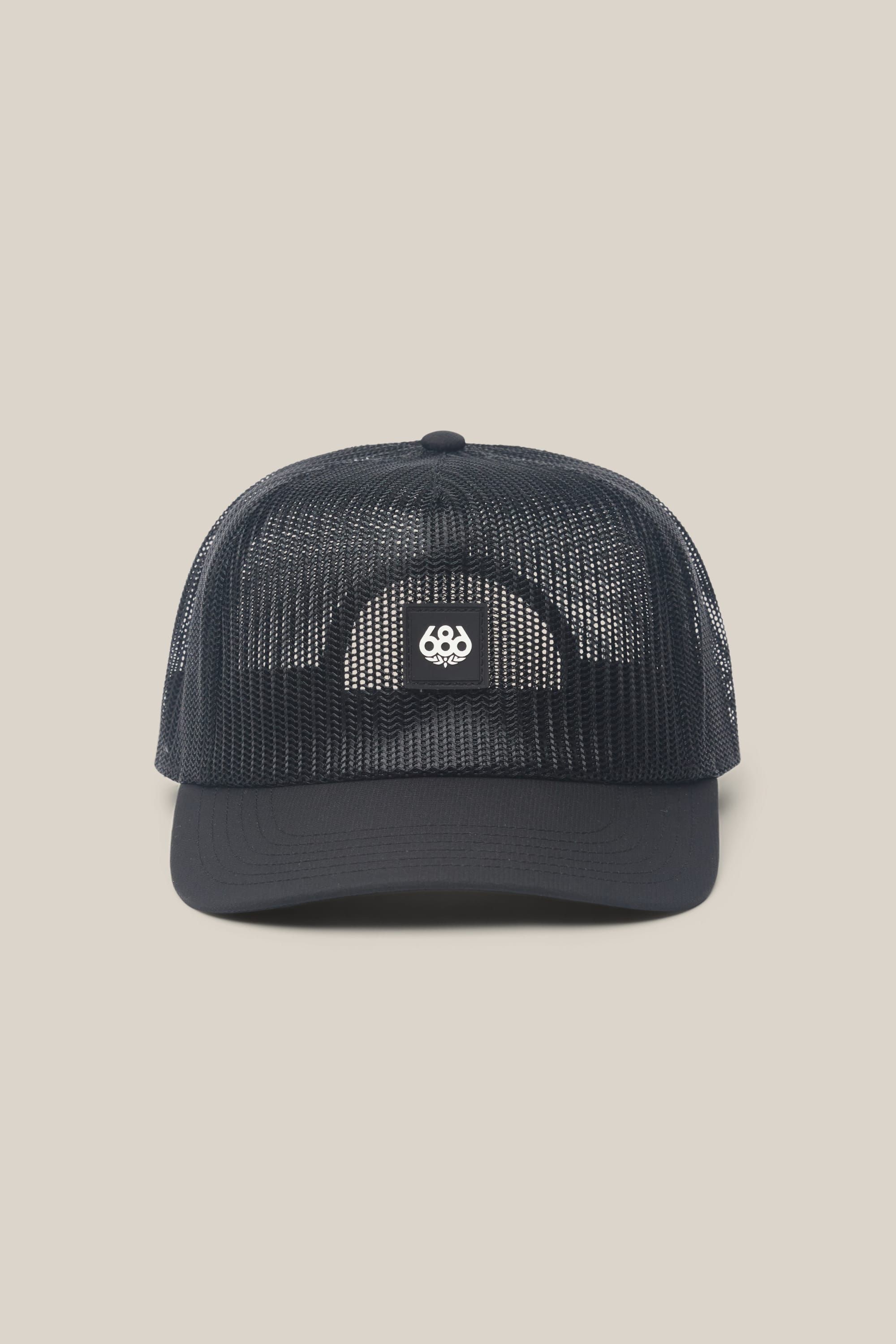 The 686 High-Pro Knockout Structured 5 Panel Hat is a black men's trucker hat with mesh panels, a curved brim, and a small white 686 logo on the front, displayed against a plain beige background.