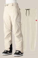 The 686 Women's SMARTY® 3-in-1 Cargo Pant by 686 is shown in cream with black ankle cuffs, zippered pockets, and a removable liner, styled over black-and-white sneakers and paired with matching cream jogger pants for versatile wear.