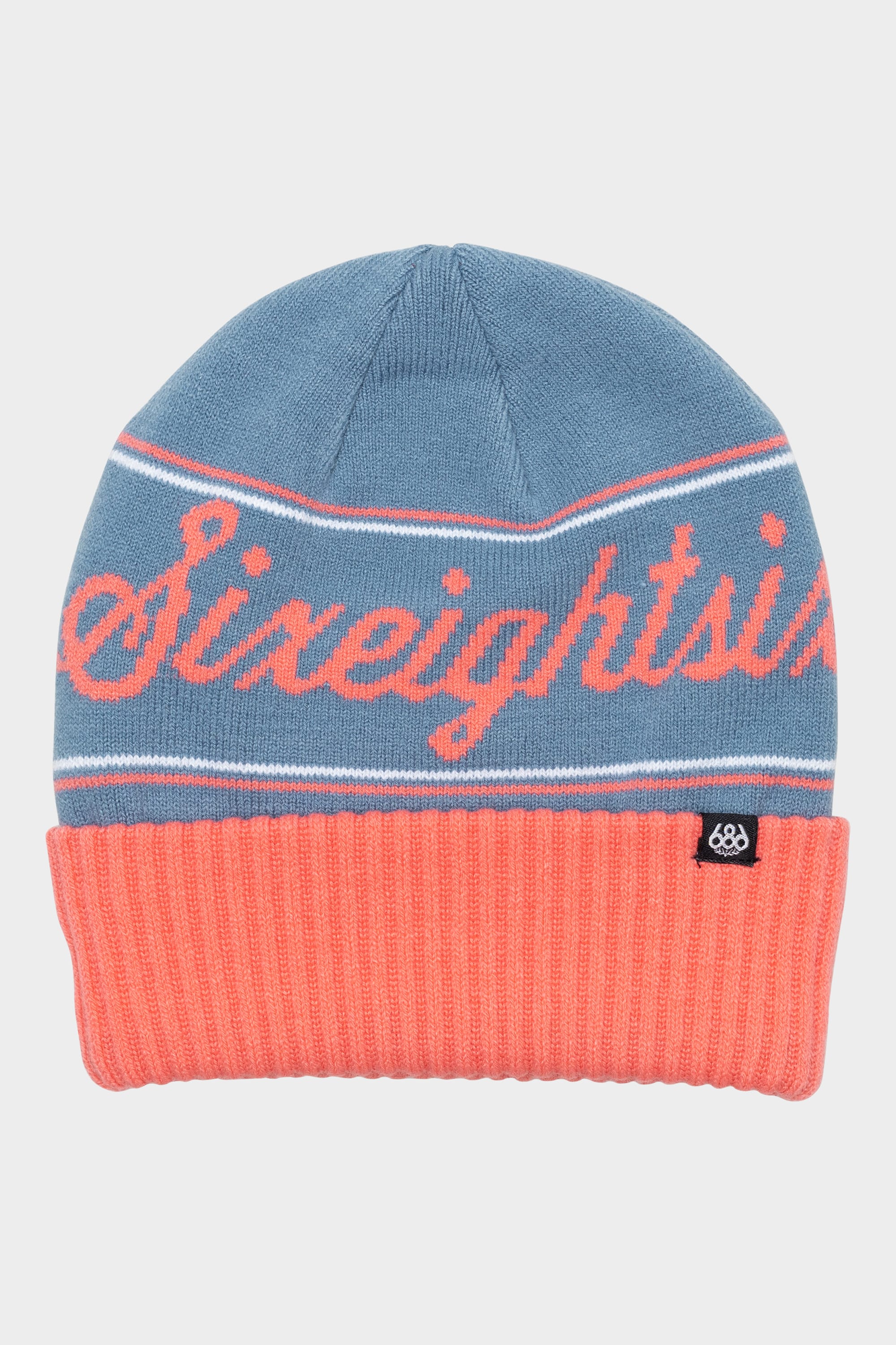 The 686 Girls Roll-Up Beanie features a blue knit design with a pink fold-over cuff, Sixeightsix in pink cursive on the front, and a small black logo tag on the cuff.