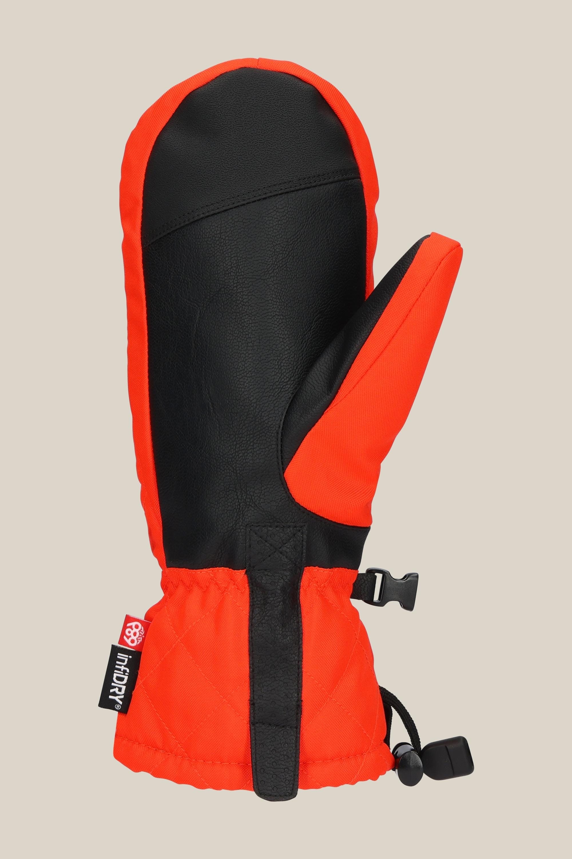 The 686 Women's Jubilee™ Mitt by 686 is a bright red and black waterproof mitt with light insulation, a black palm, adjustable strap, and cinch cord at the cuff, shown on a beige background.