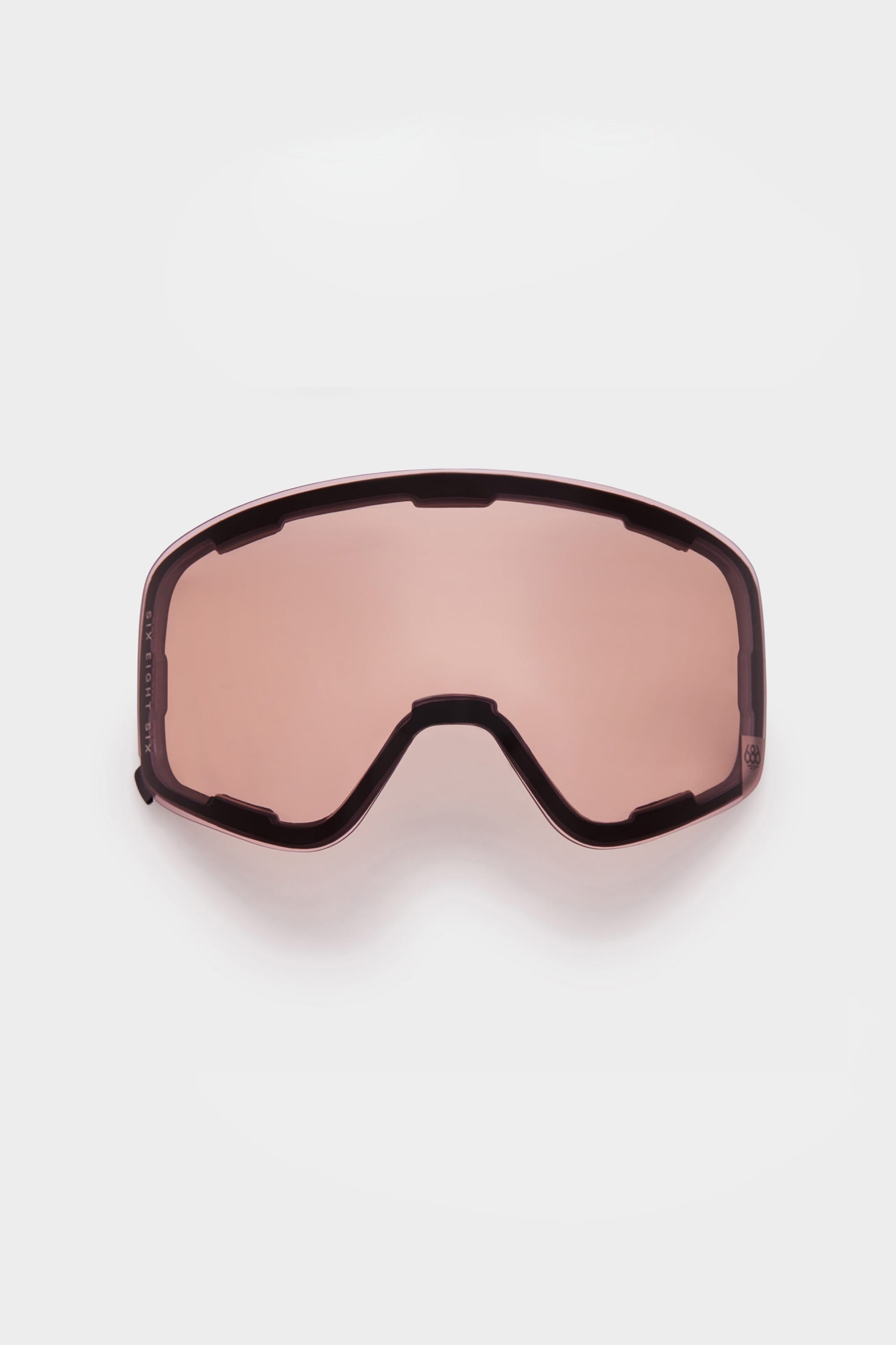 The 686 SMARTY® Magnetic Goggle Replacement Lens by 686 is a pink-tinted, wide, curved lens with an easy-swap magnetic design and black frame, shown against a plain white background.