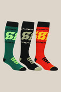 The 686 Mens Flame Socks 3 Pack by 686 features knee-high performance socks in green, black, and red, each with a bold “68” logo and barbed wire pattern around the calf, displayed side by side on a plain background.