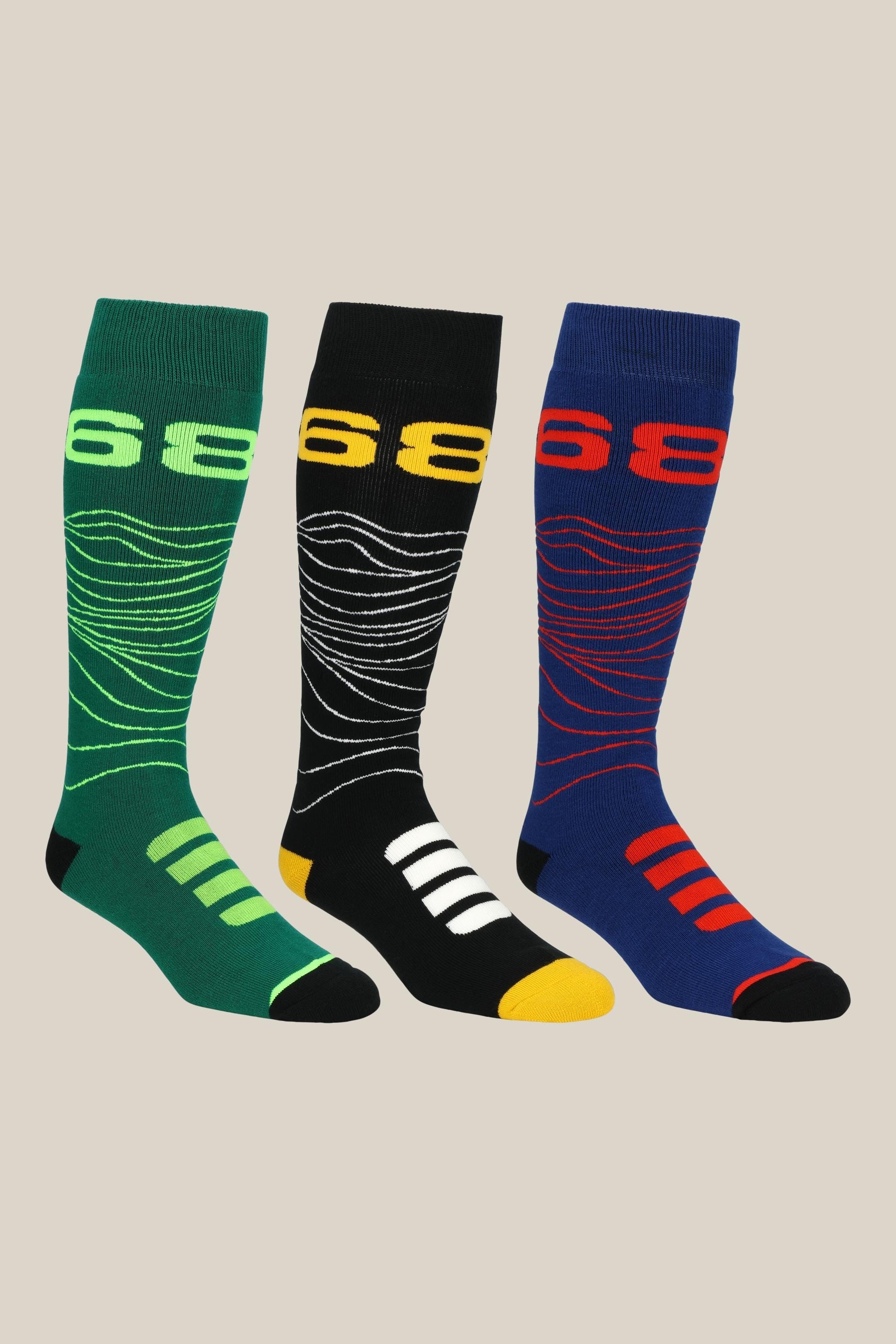 The 686 Mens Topo Socks 3 Pack includes green, black, and blue pairs with curved line patterns and bold 66 near the top, plus matching heel and toe accents. Made from soft acrylic for lasting comfort and durability.