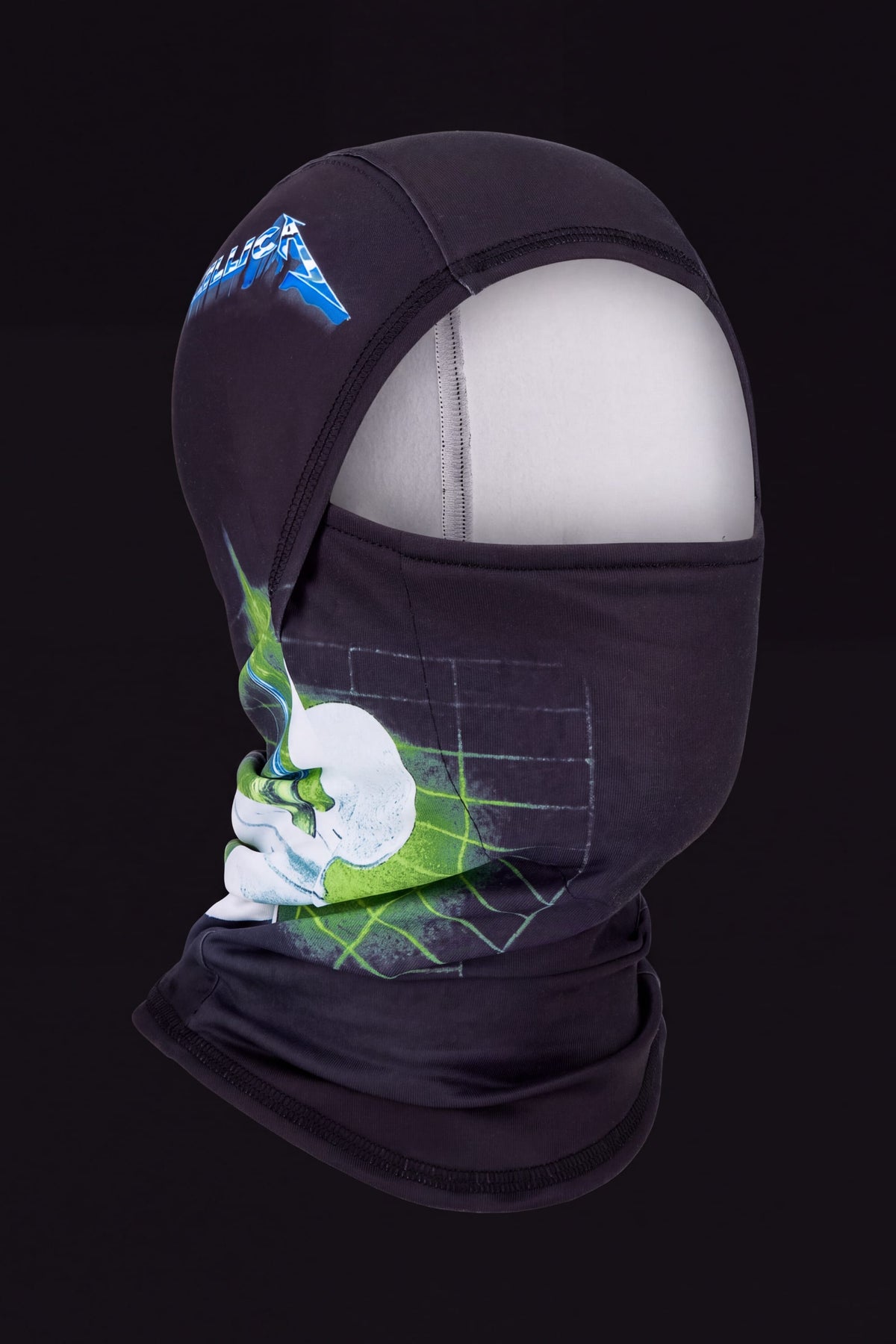 686 Hurra Hinged Balaclava featuring a Metallica logo and a green and white graphic print of a skull and grid.