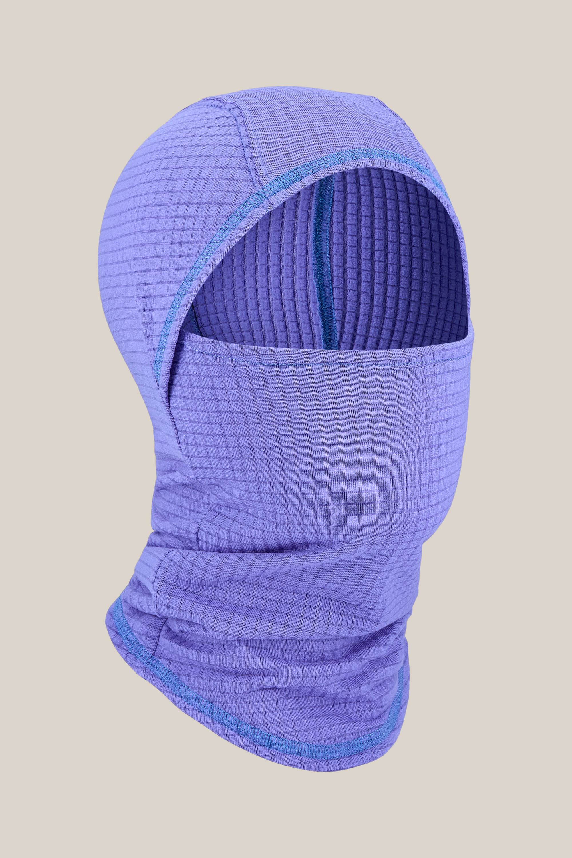 The 686 Mission Grid™ Balaclava by 686 is a purple, textured knit facemask featuring a grid pattern that covers the entire head and neck except for the eyes, shown against a neutral background.
