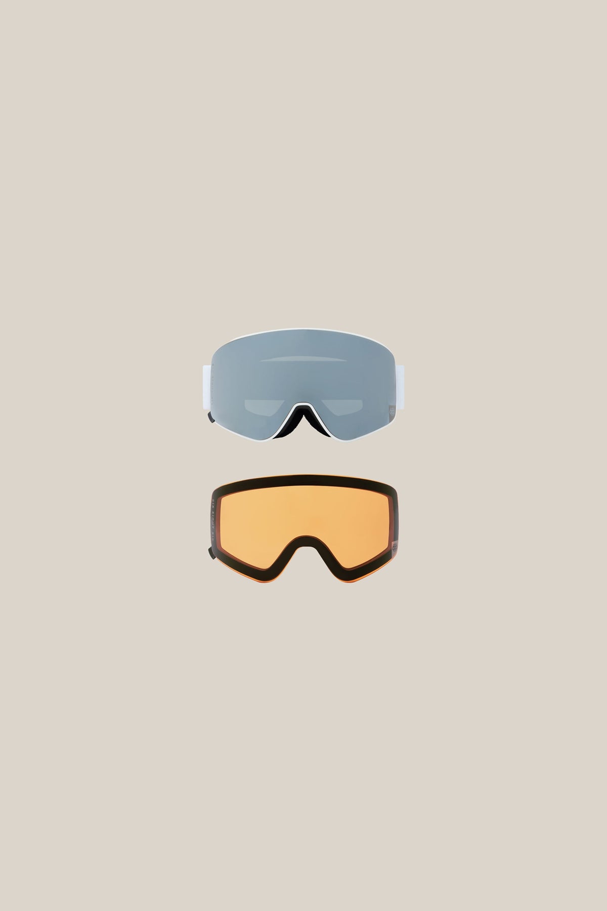 Two 686 SMARTY® Magnetic Goggle - Small pairs shown from the front: one with a silver mirrored lens and white frame, and one with an amber lens and black frame.